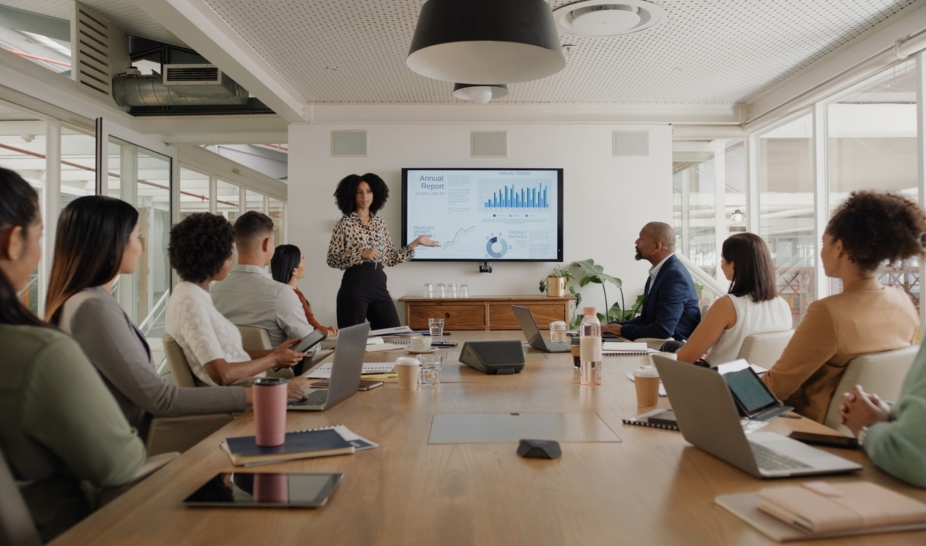 CMO leading a marketing meeting with an executive team