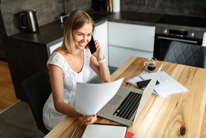 woman with a hybrid work environment working at home